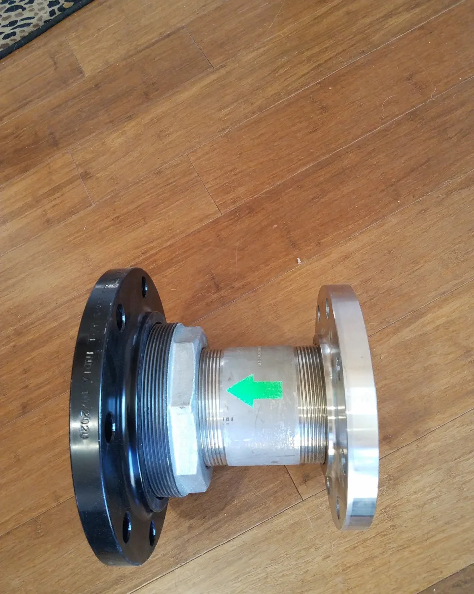 Flanged Water Flow Management device with flow-direction arrow